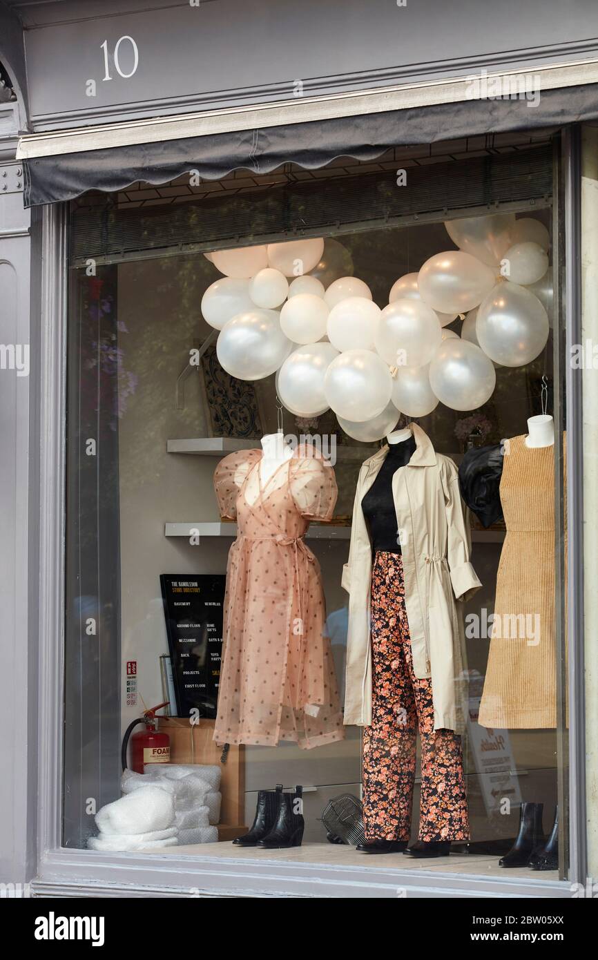 Retail store shopfronts on Winchester High Street, Hampshire Stock