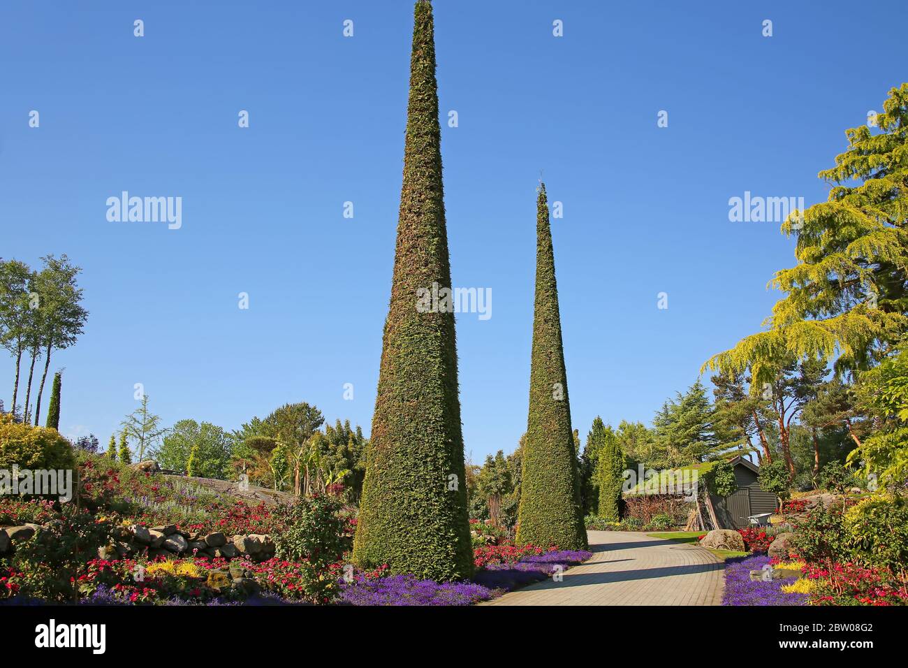 Beautiful plants, flowers, and trees at Flor & Fjaere gardens on the island of Sor-Hidle outside of Stavanger, Norway. Stock Photo