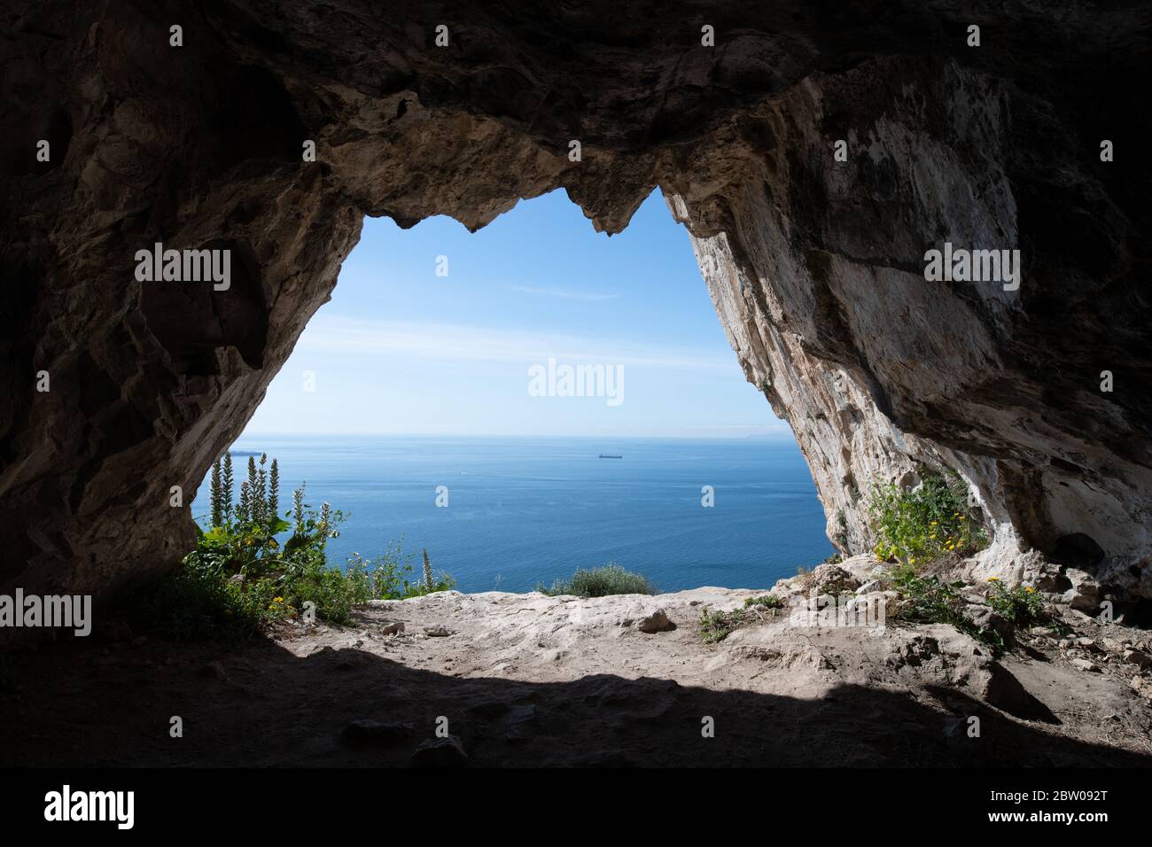 View looking out from one of the Goats Hair Twin Caves in Gibraltar Stock Photo