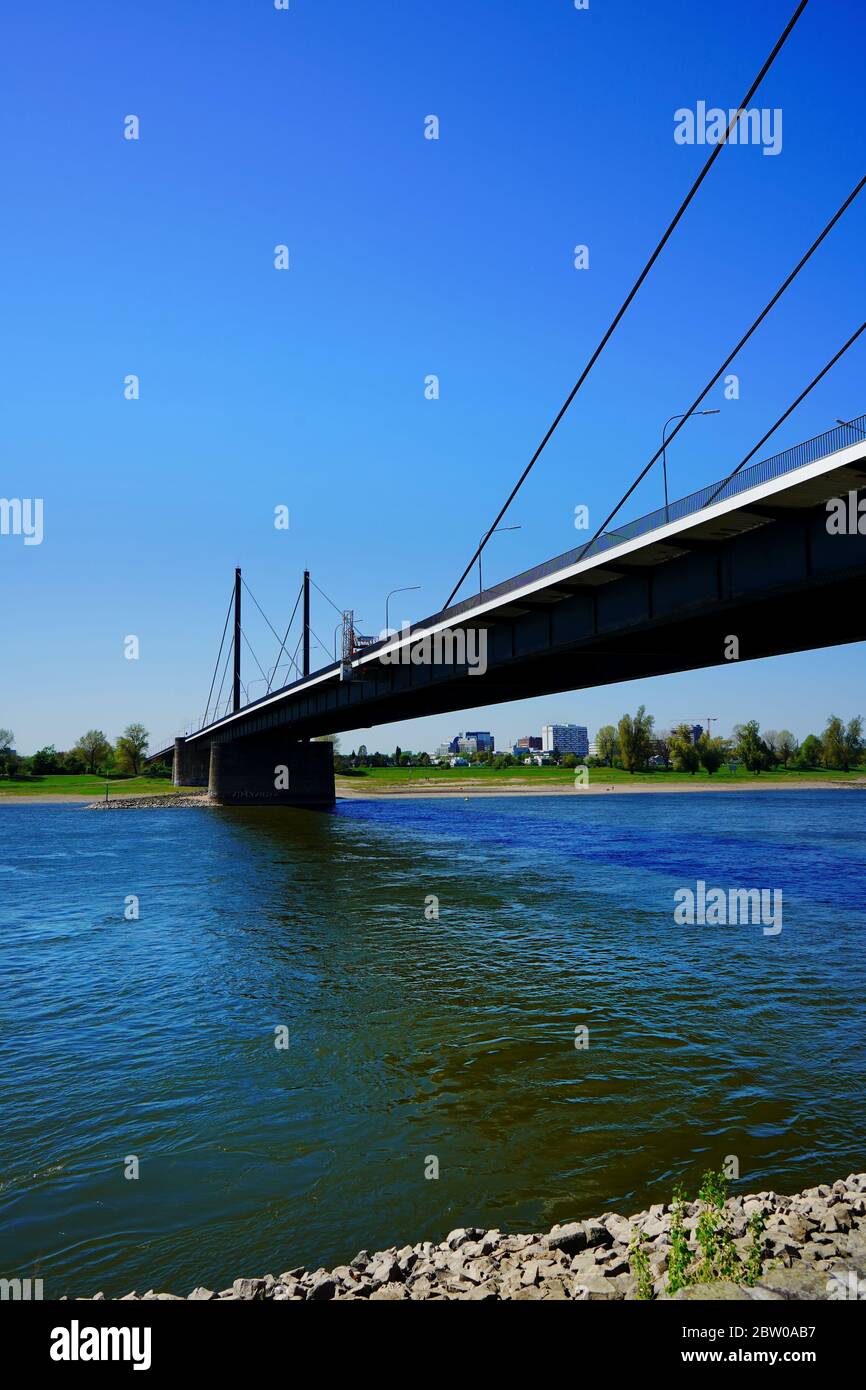 Theodor-Heuss-Brücke (Theodor-Heuss-Bridge), built in 1957. It crosses Rhine river. Photo taken from the river bank in the district of Golzheim. Stock Photo