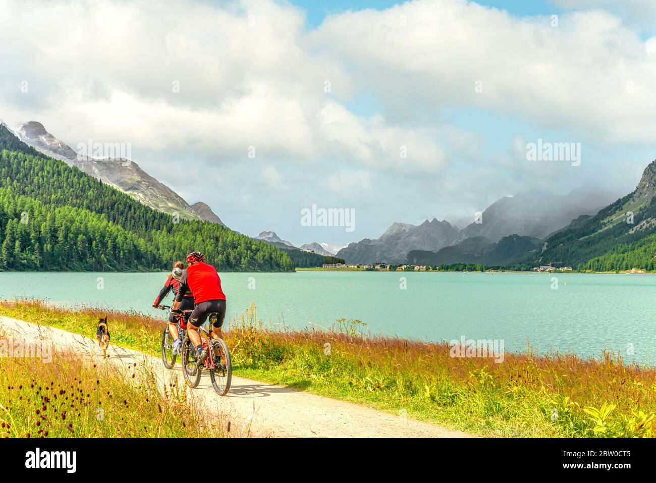 Mountain biker at Lake Silvaplana, Engadine, Switzerland Stock Photo