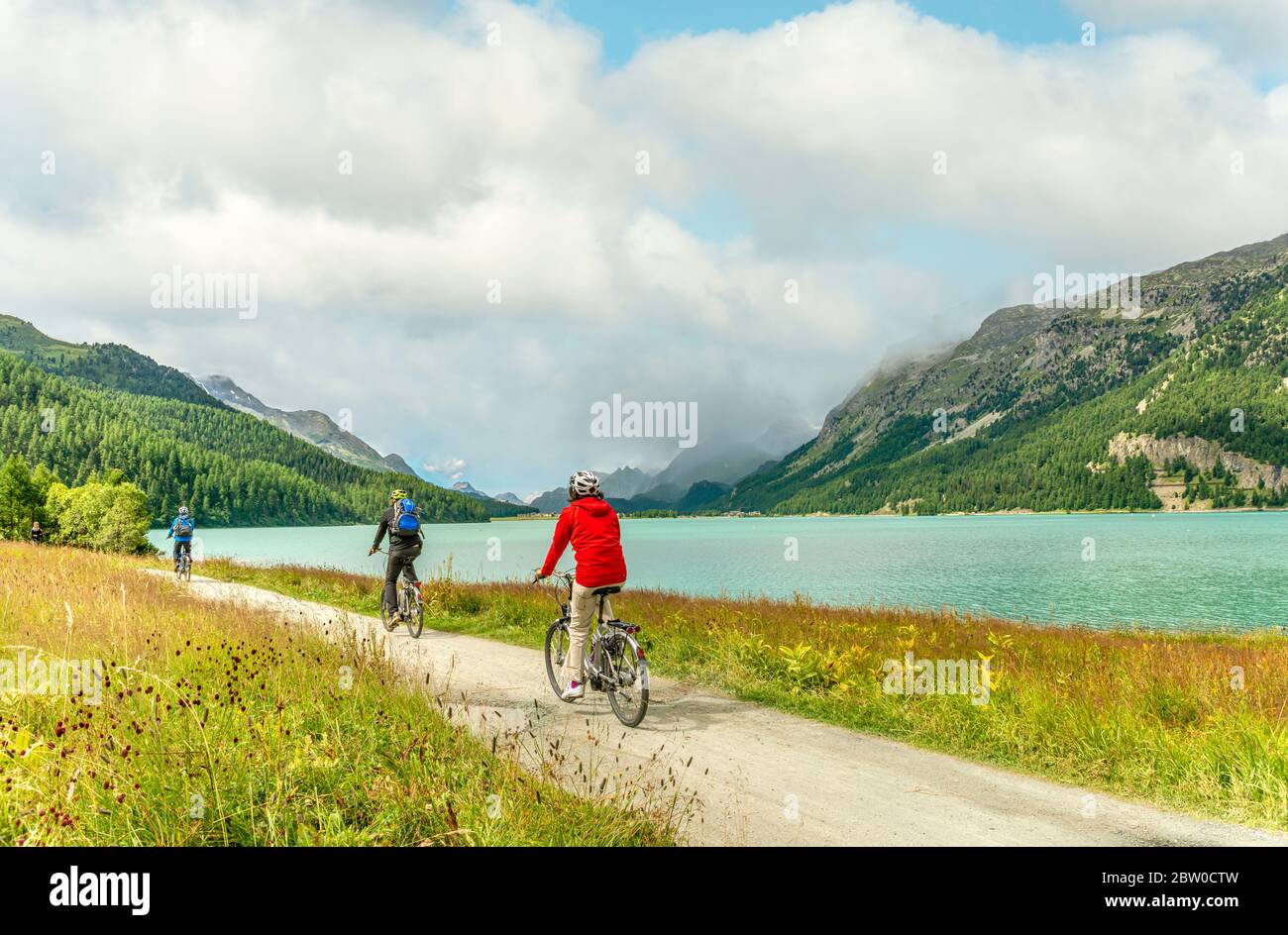 Mountain biker at Lake Silvaplana, Engadine, Switzerland Stock Photo