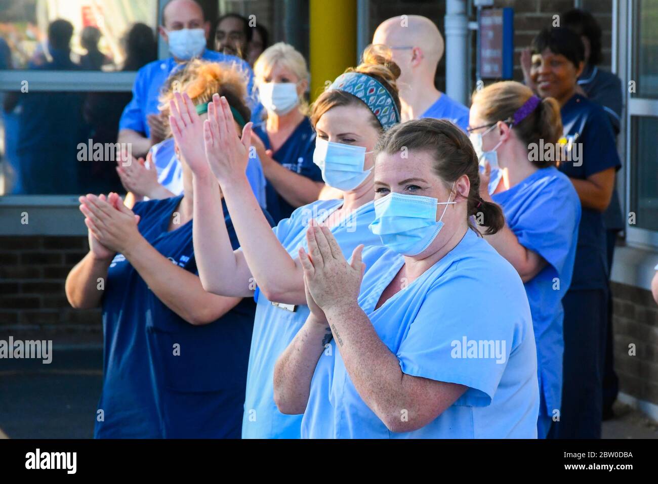 Dorset County Hospital, Dorchester, Dorset, UK.  28th May 2020.  Doctors, Nurses and frontline staff outside the Accident and Emergency entrance at Dorset County Hospital at Dorchester in Dorset to clap for the final time for the NHS, Carers, Key Workers and Front Line staff.  Picture Credit: Graham Hunt/Alamy Live News Stock Photo