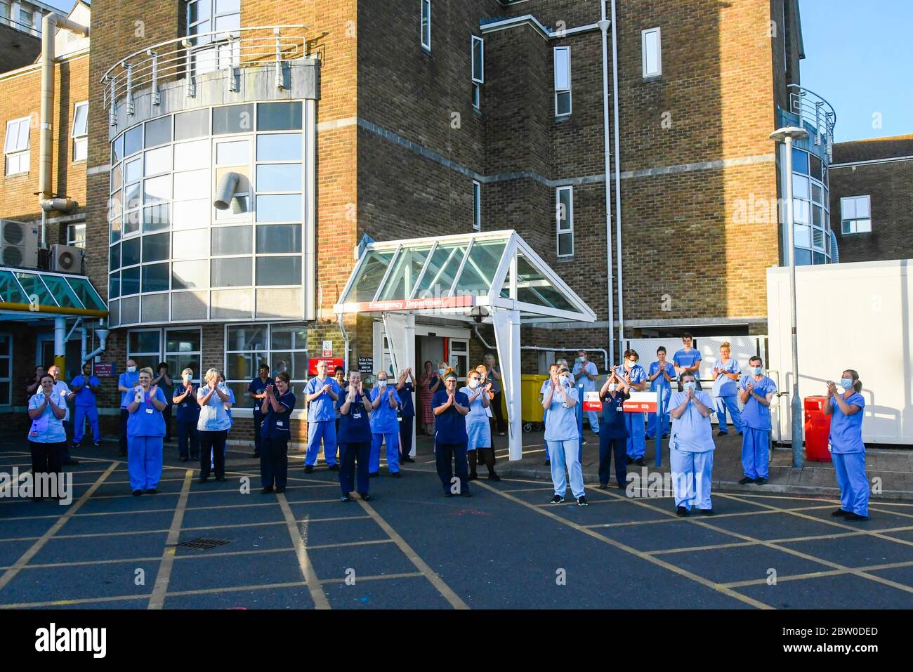 Dorset County Hospital, Dorchester, Dorset, UK.  28th May 2020.  Doctors, Nurses and frontline staff outside the Accident and Emergency entrance at Dorset County Hospital at Dorchester in Dorset to clap for the final time for the NHS, Carers, Key Workers and Front Line staff.  Picture Credit: Graham Hunt/Alamy Live News Stock Photo