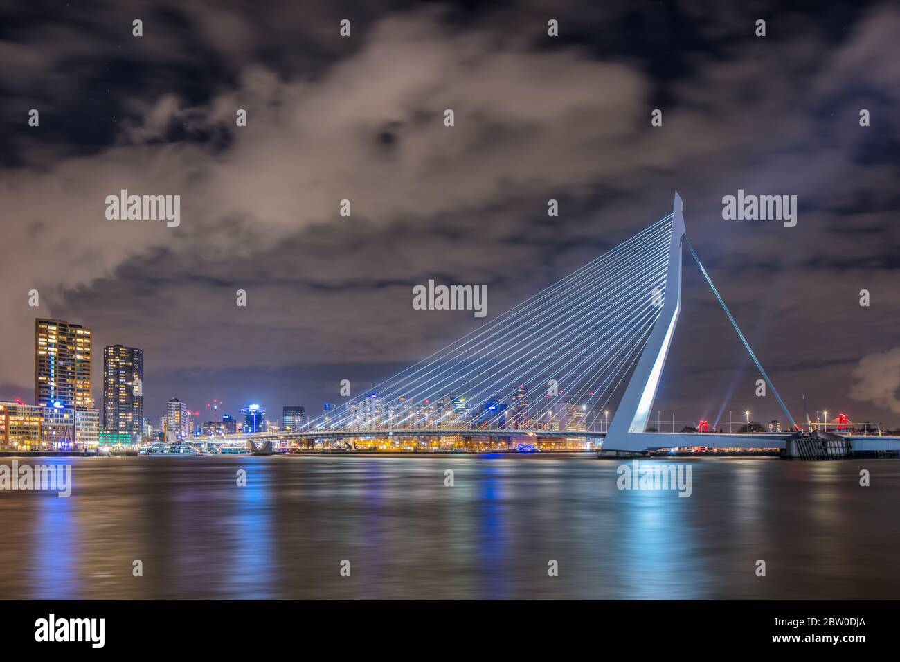The iconic Erasmus Bridge at night. The 284m long bridge was designed ...