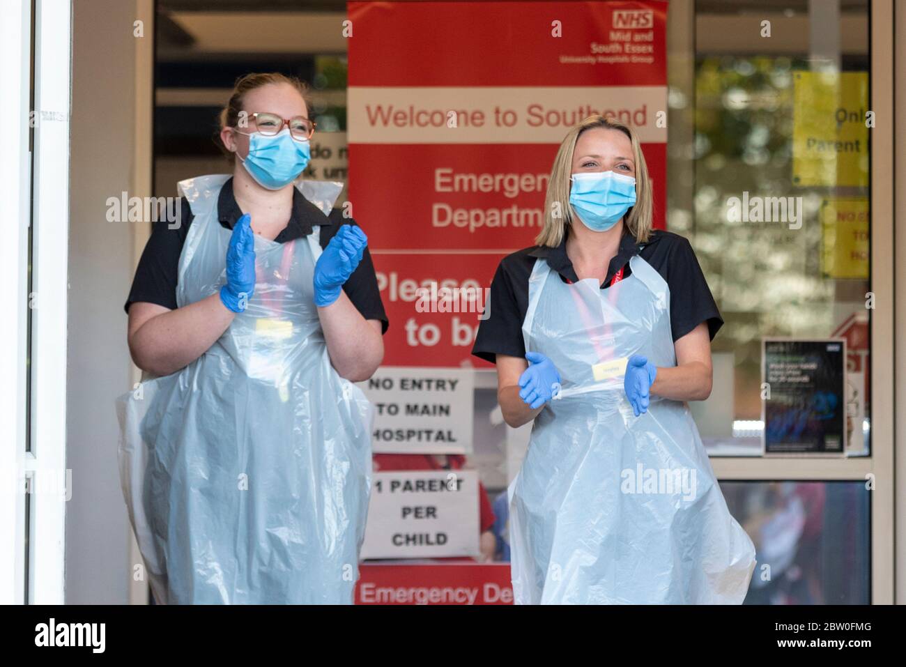 Southend University Hospital, Southend on Sea, Essex, UK. 28th May, 2020. The final ‘Clap for Carers’ has been held at 8pm on Thursday evening to thank NHS and key workers during the COVID-19 Coronavirus pandemic. NHS staff joining in with the applause Stock Photo