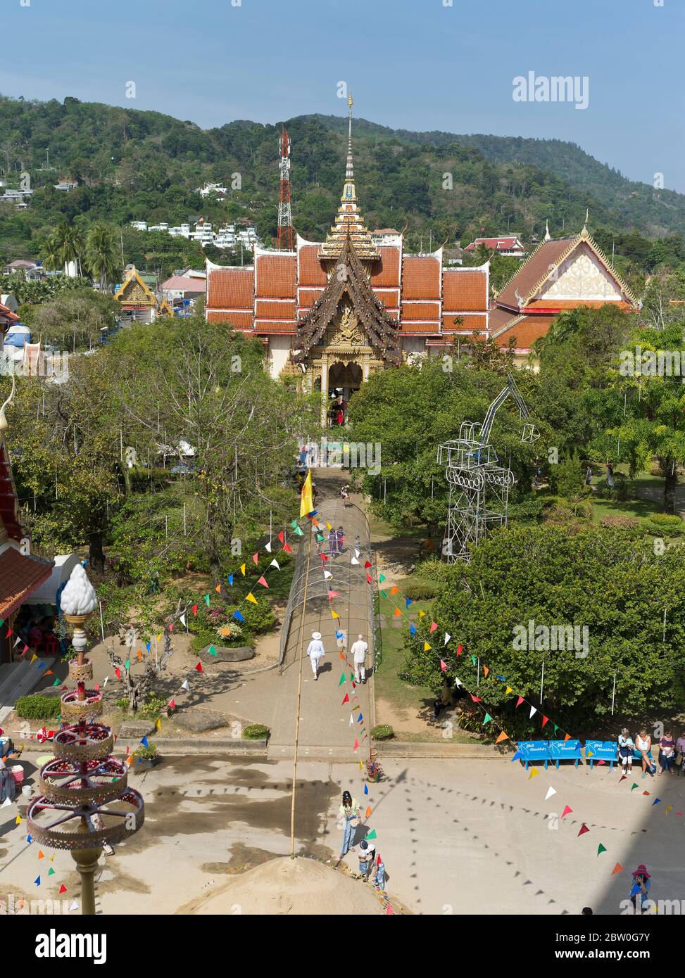 dh Wat chalong Buddhist temple PHUKET THAILAND Buddhism Wat Chaiyathararam temples grounds with tourists Stock Photo