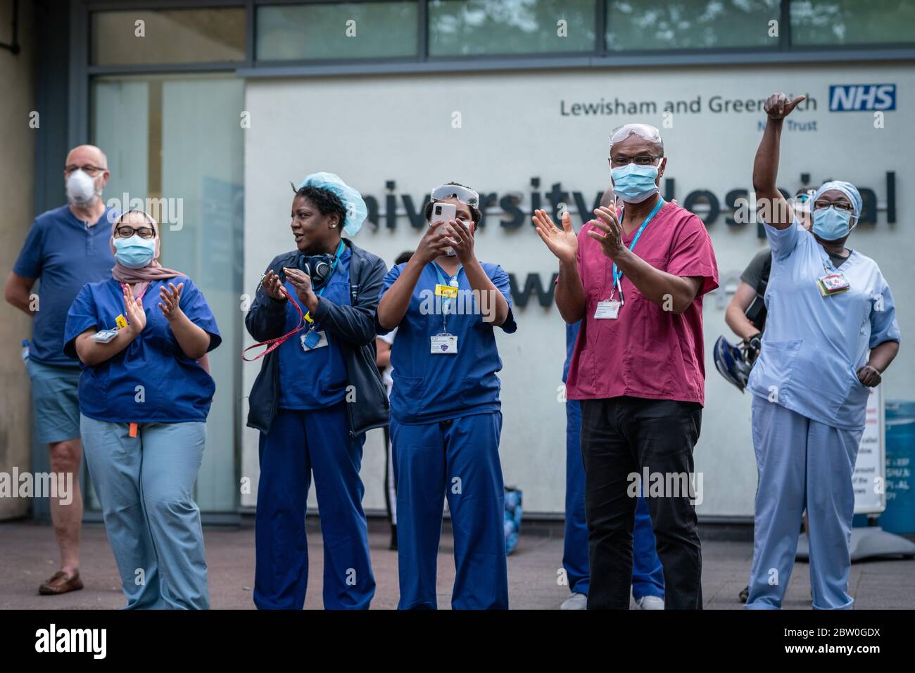 Coronavirus: ‘Clap For Our Carers’ outside NHS University Lewisham Hospital, London, UK. Stock Photo