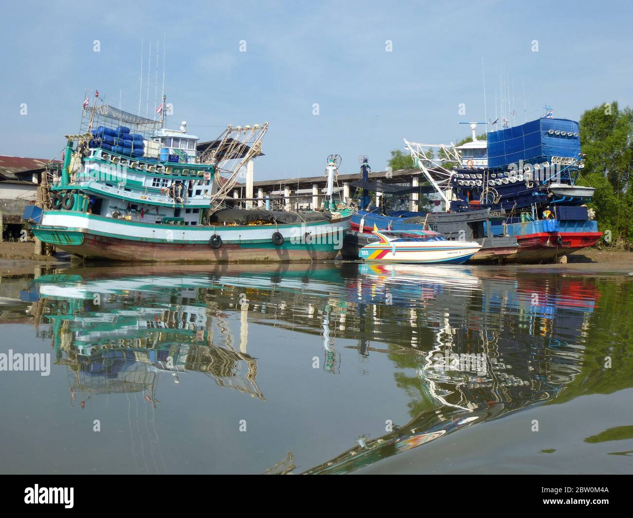 Old fishing trawlers in Thailand Stock Photo