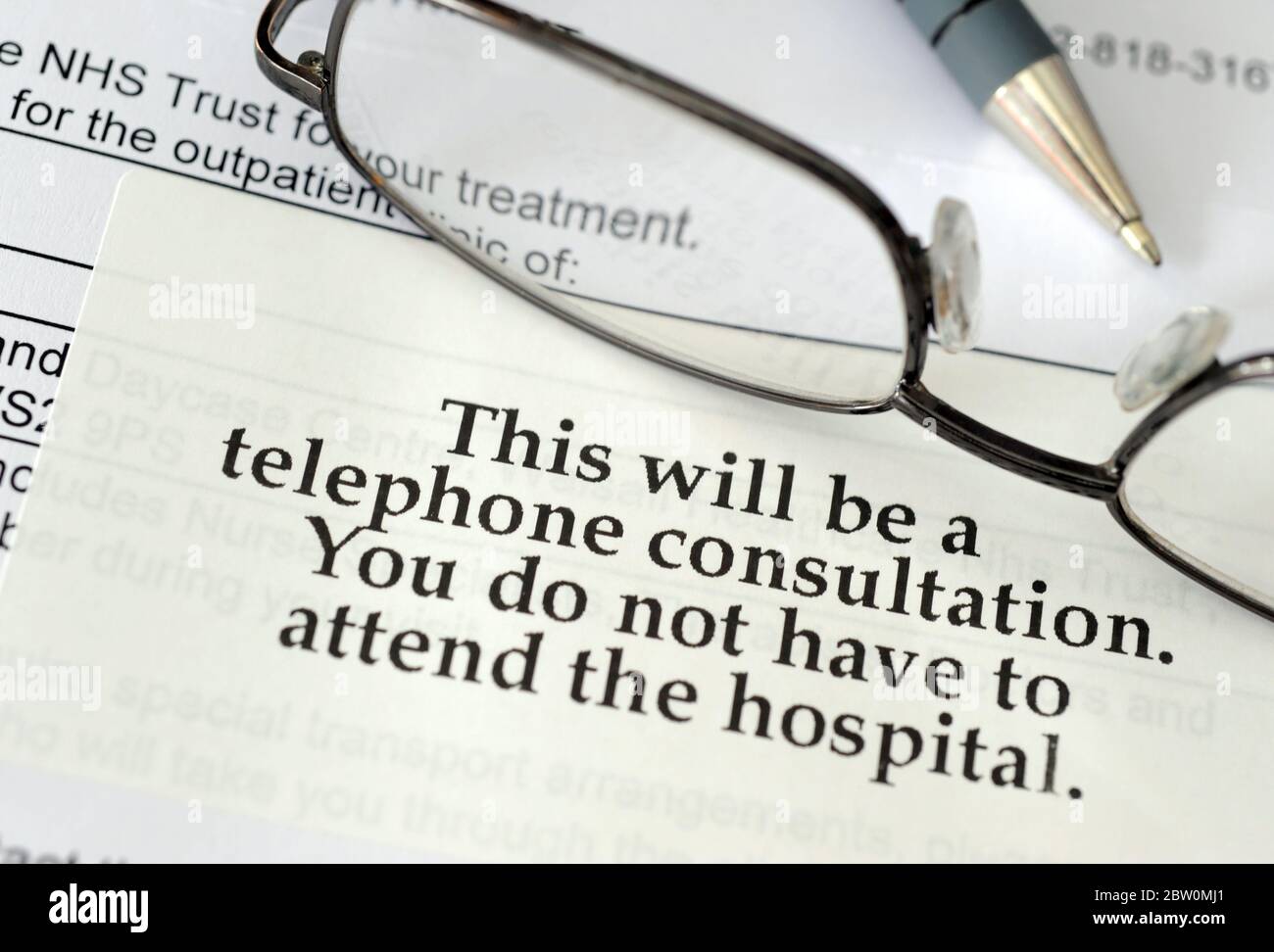 NHS  HOSPITAL OUTPATIENT APPOINTMENT LETTER WITH TELEPHONE CONSULTATION INFORMATION STICKER RE COVID-19 CORONAVIRUS HEALTH CRISIS ETC UK Stock Photo