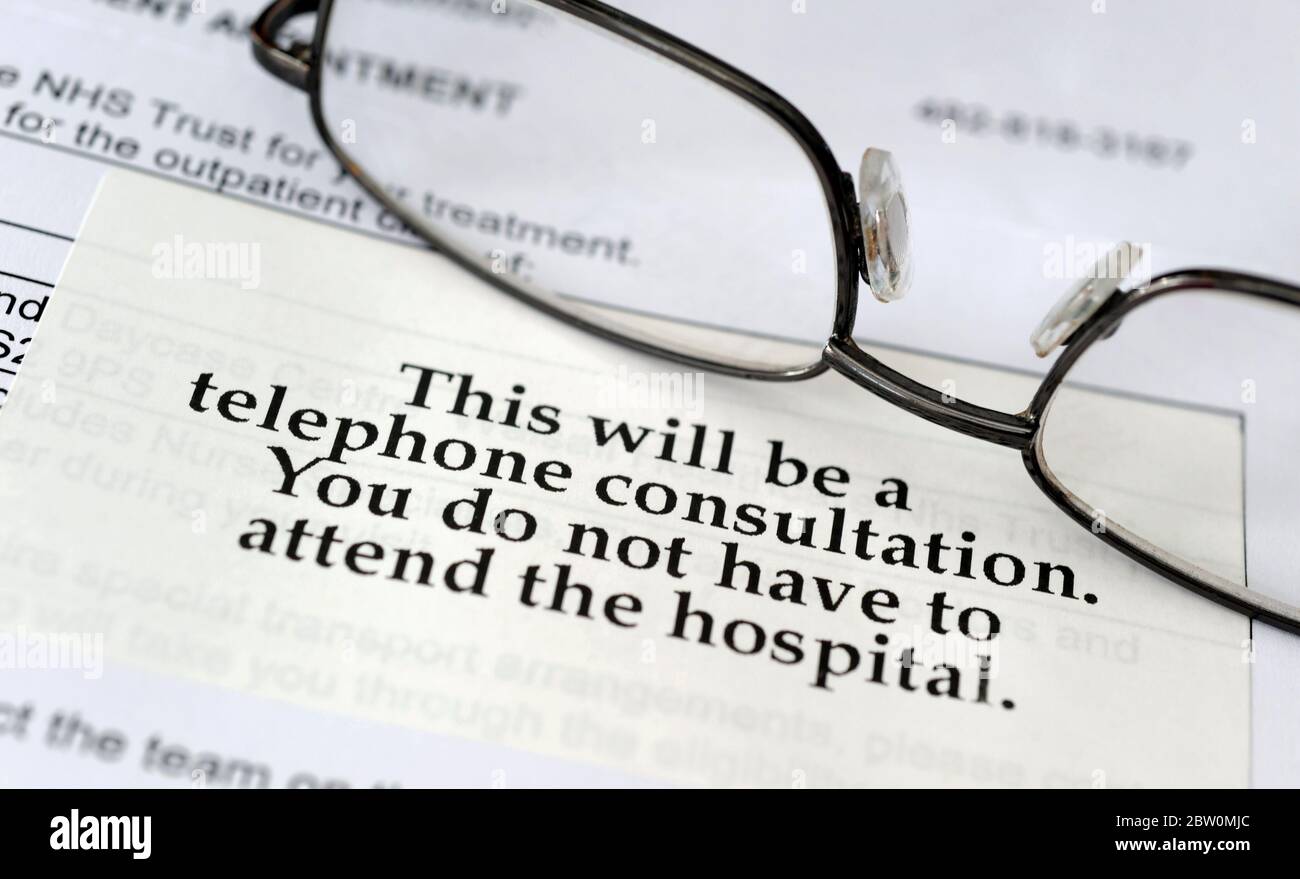 NHS  HOSPITAL OUTPATIENT APPOINTMENT LETTER WITH TELEPHONE CONSULTATION INFORMATION STICKER RE COVID-19 CORONAVIRUS HEALTH CRISIS ETC UK Stock Photo