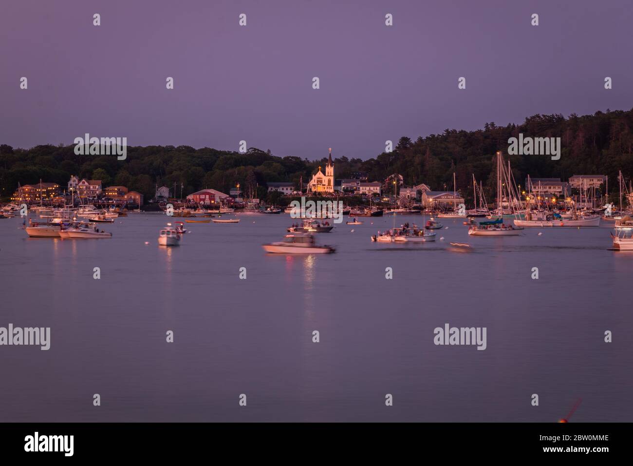Boothbay Harbor, Maine, USA July 4, 2019 Boats in the harbor at dusk