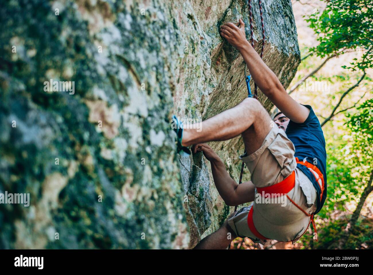 Man Makes A Big Wall Climbing In The Mountains Stock Photo Alamy