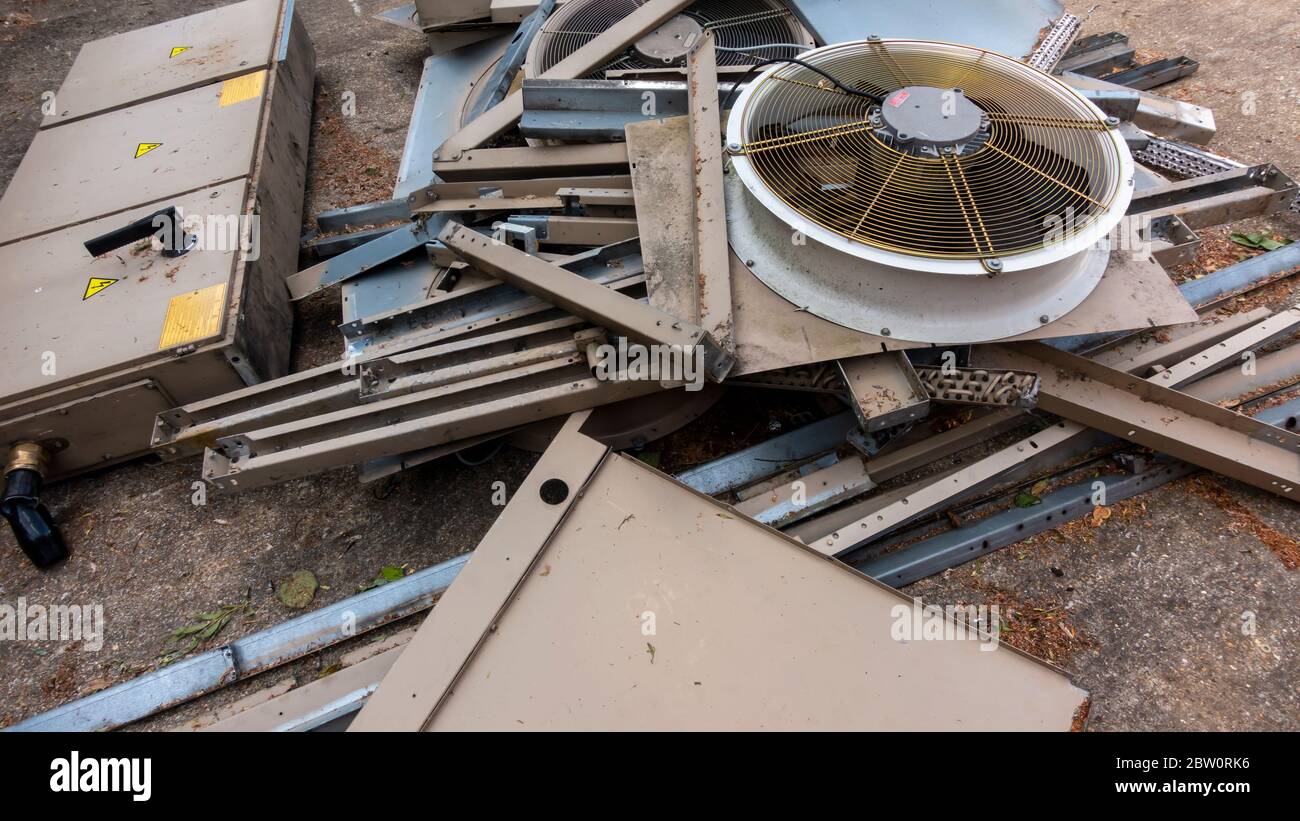 Dismantled industrial chiller laying in a heap of scrap showing the ...