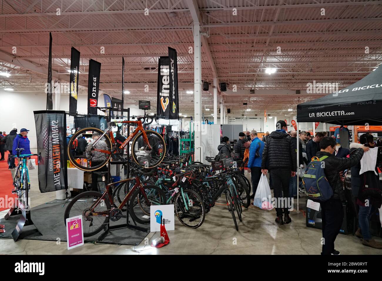 TORONTO - MARCH 6, 2020: Cycling is an increasingly popular form of exercise and bicycle shows offering high end bikes attract large crowds. Stock Photo