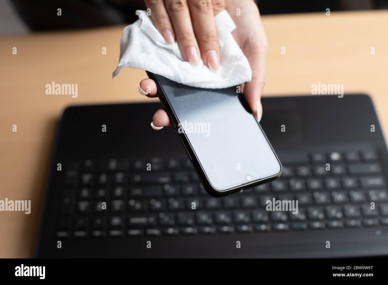 work from home safe, cleaning and disinfecting smartphone and laptop