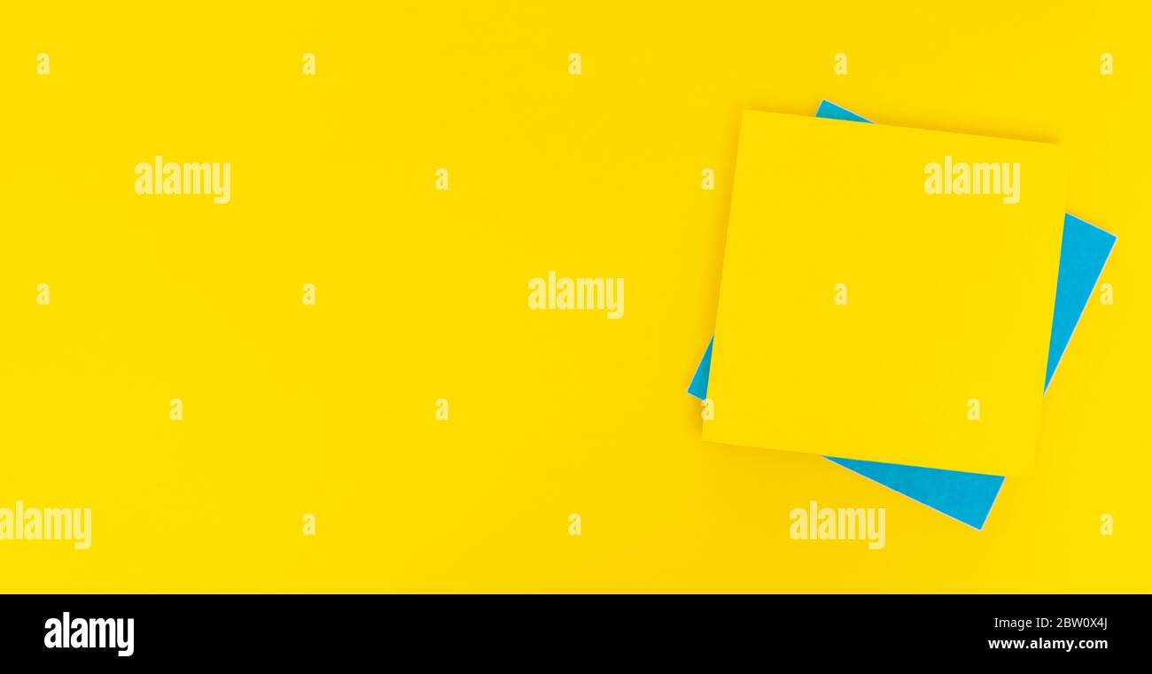 Colored paper stickers on a yellow background, space for text, ad unit Stock Photo
