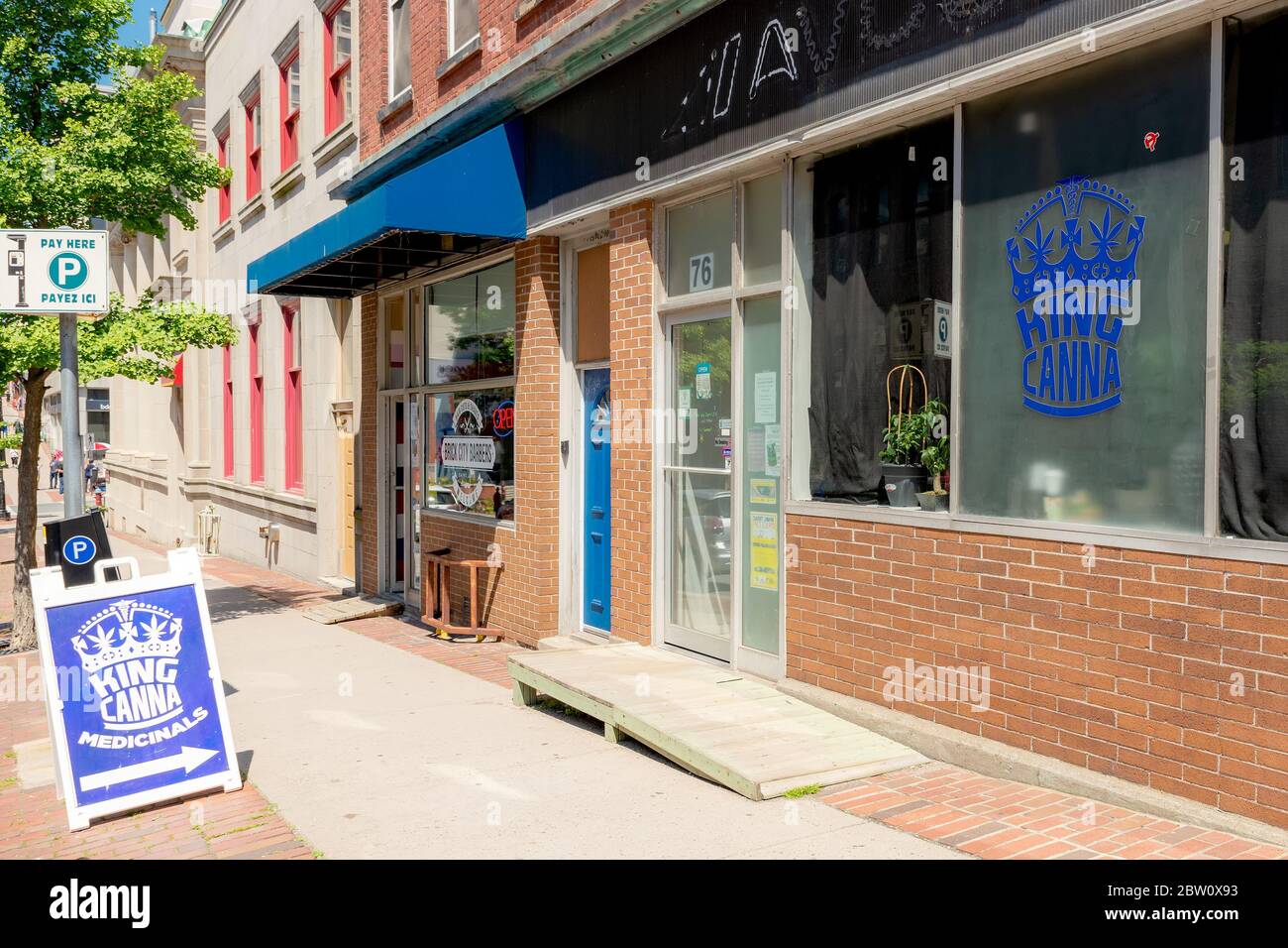 Saint John, NB, Canada - July 20, 2019: King Canna is an unlicensed cannabis dispensary. A sign on the sidewalk advertises 'medicinal'. Unlicensed can Stock Photo