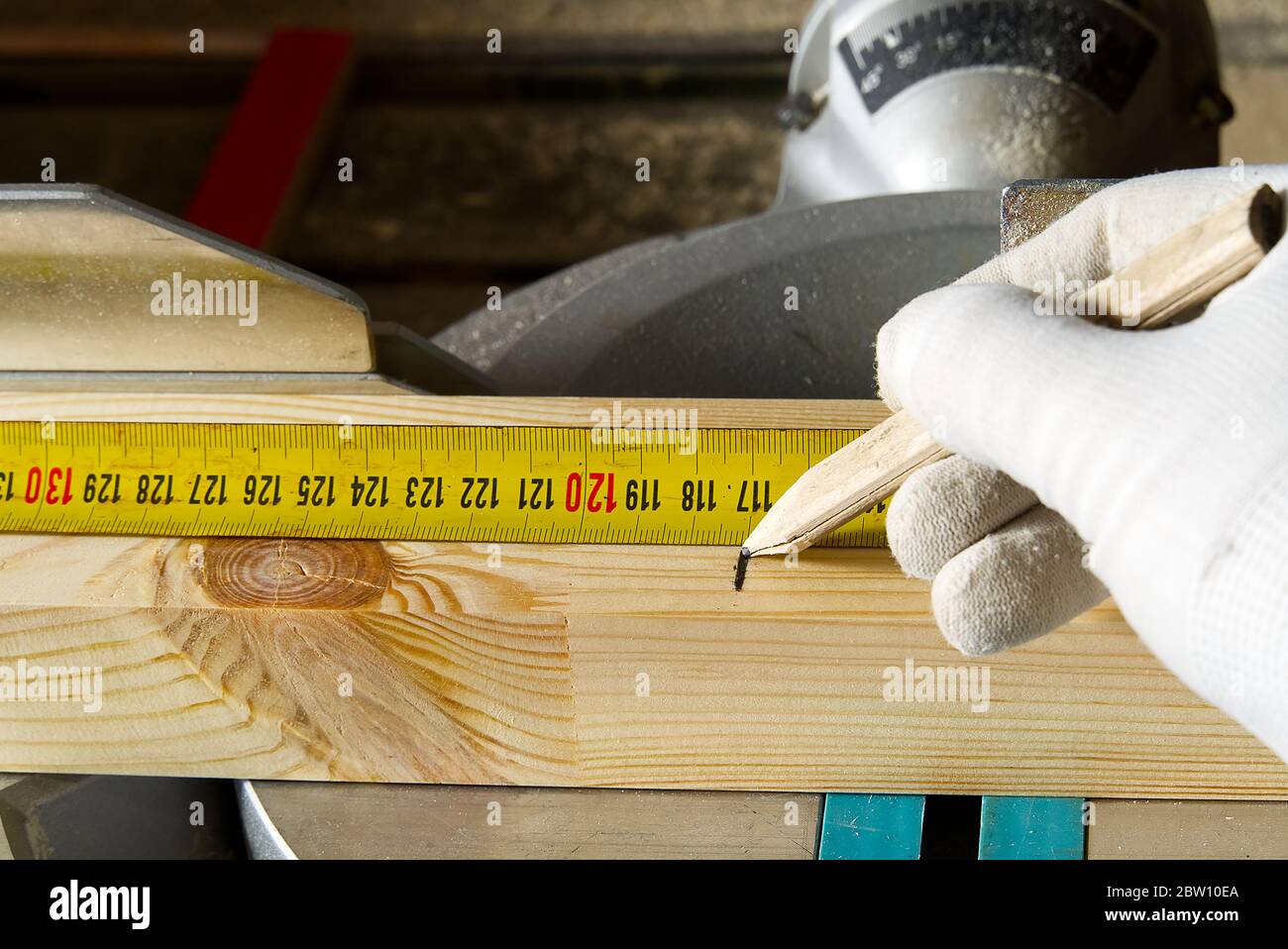 Closeup of professional makers working Measuring tape at