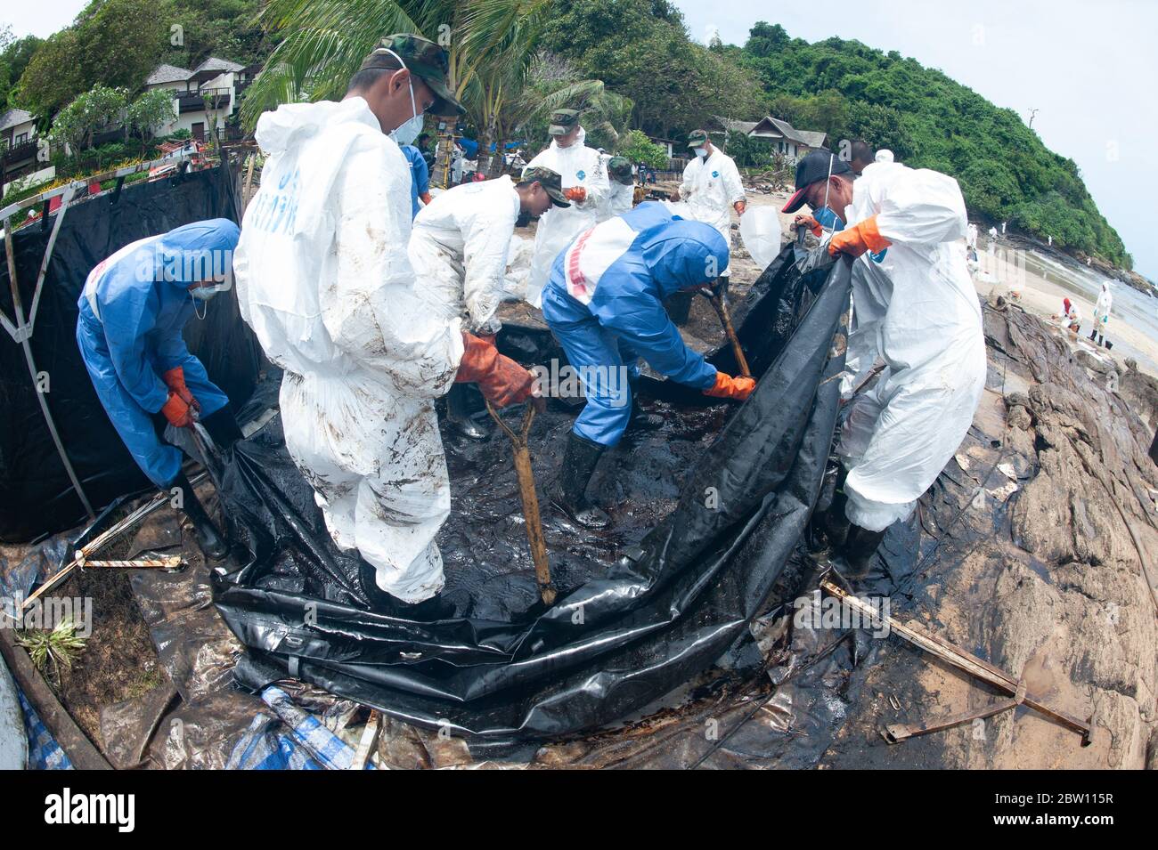 A large plastic tank for storing crude oil that flows into the sea and