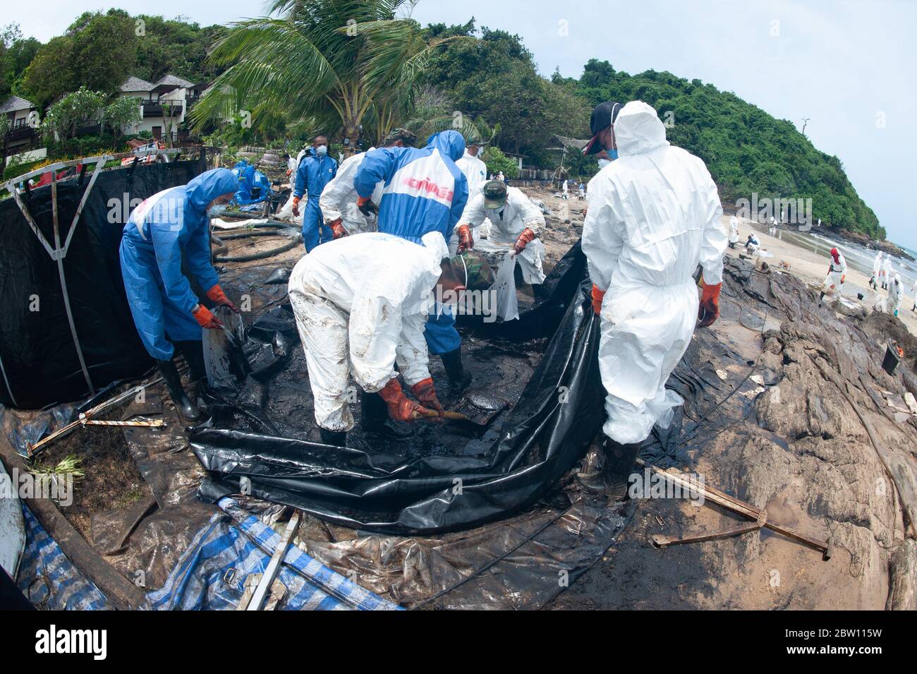 A large plastic tank for storing crude oil that flows into the sea and