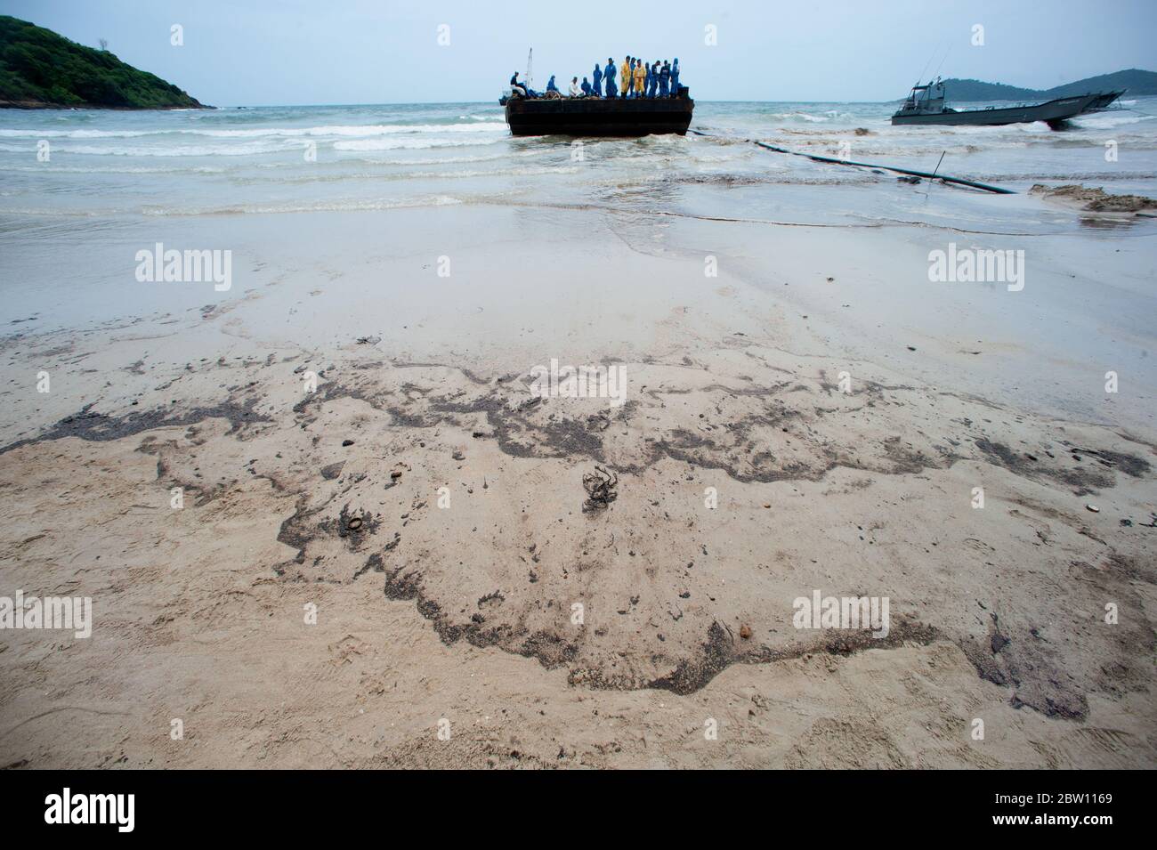 Black oil marks on the beach Which is harmful to the environment Stock