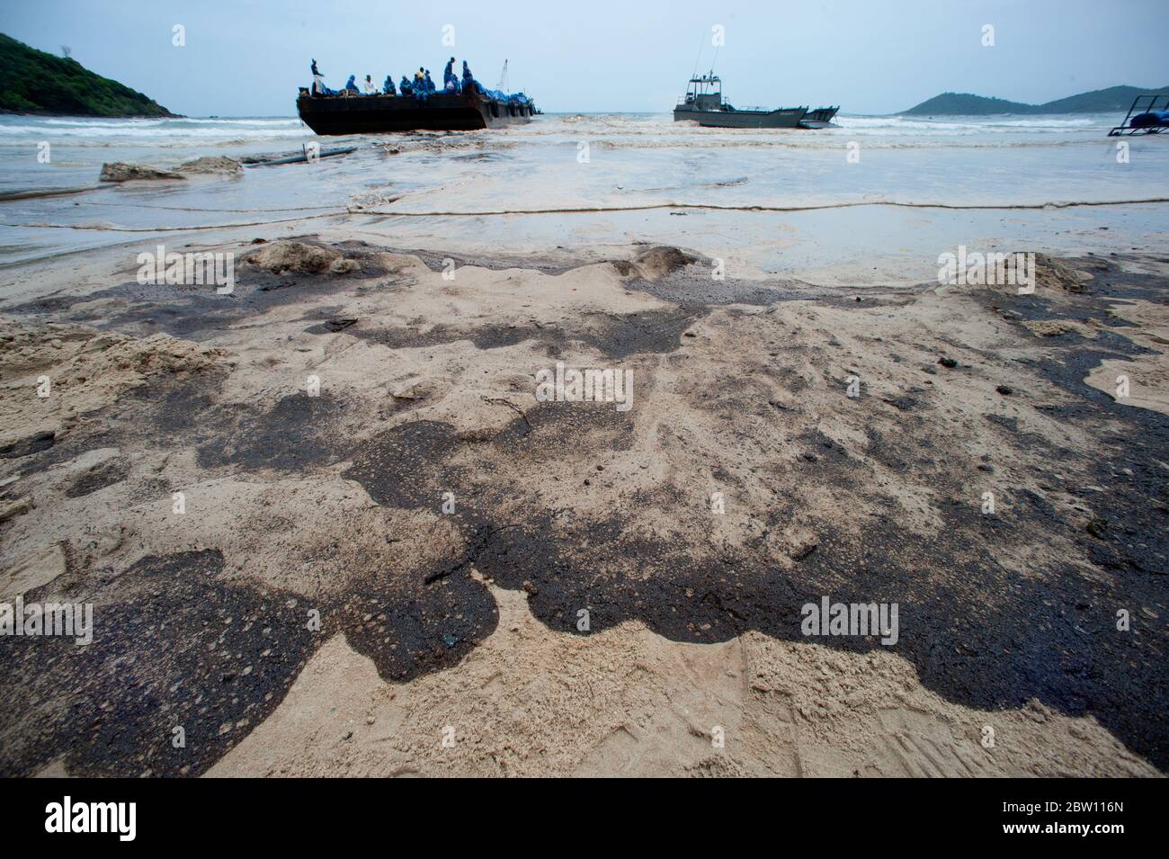 Black oil marks on the beach Which is harmful to the environment Stock