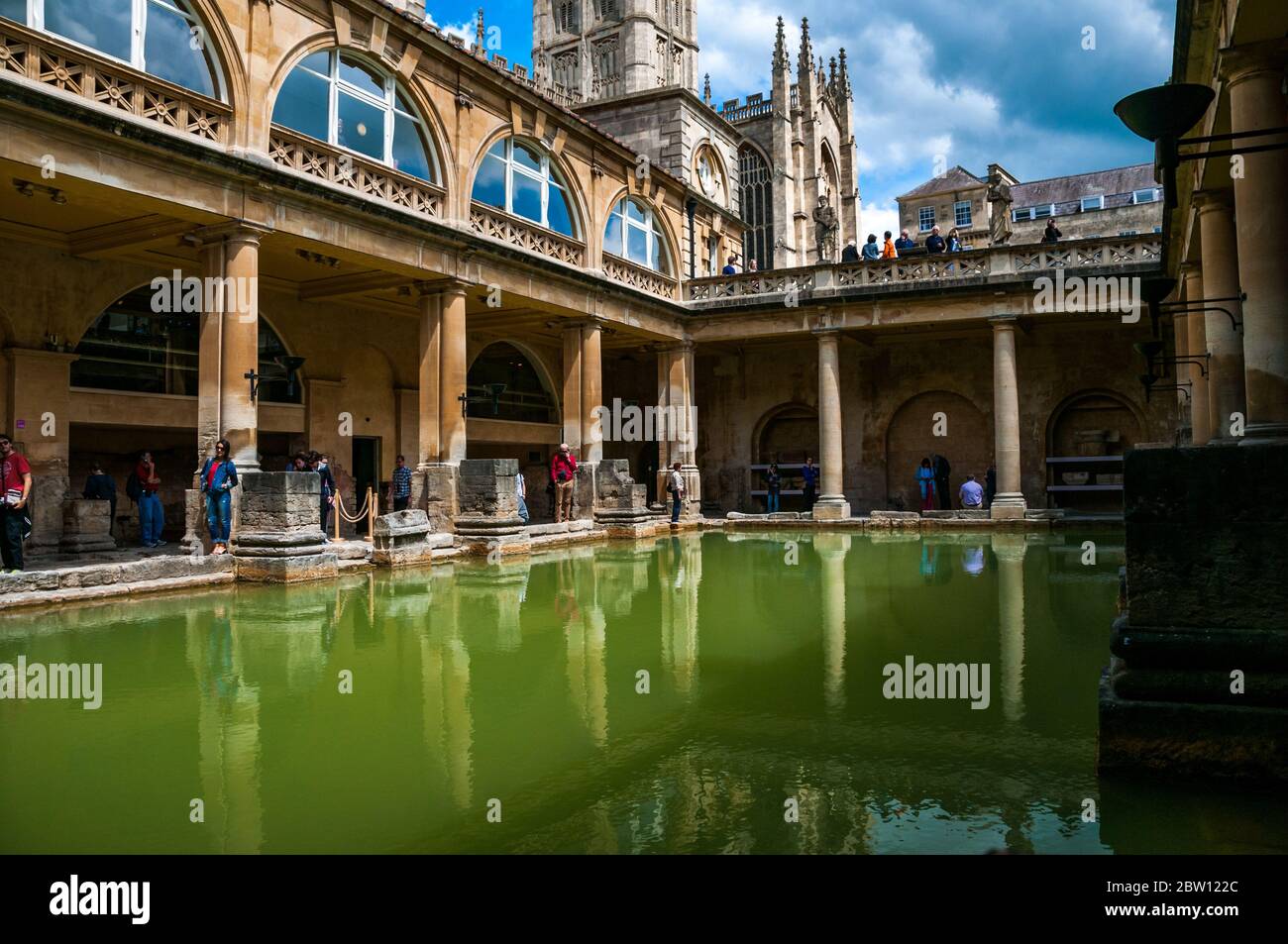 Tourists exploring the Roman Baths in Bath, England Stock Photo Alamy