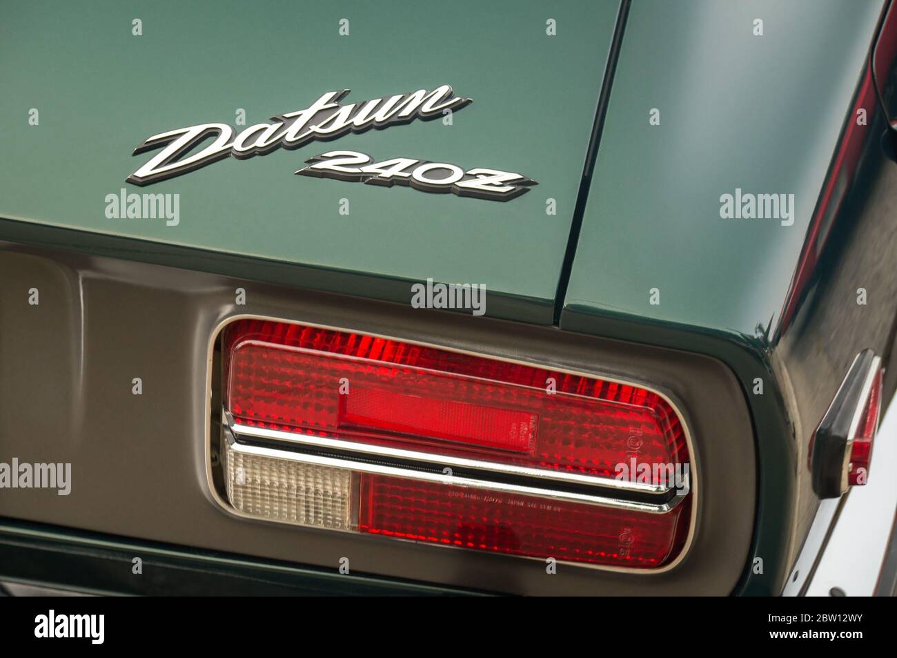 TORONTO, CANADA - 08 18 2018: Datsun logo on the trunk of 1971 Datsun 240Z coupe oldtimer sports car of Racing Green colour made by Nissan Motor Co Stock Photo