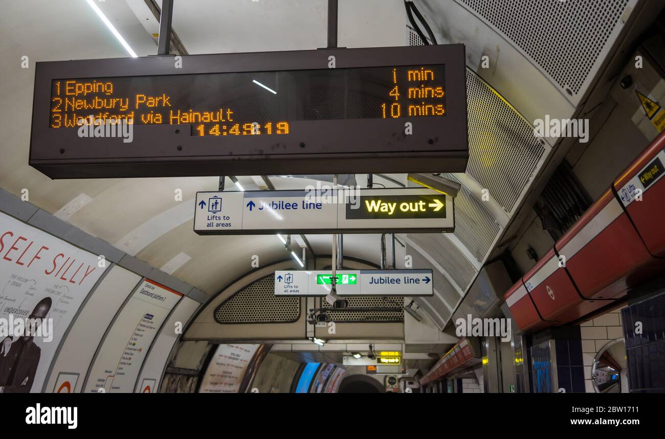 Electronic departure time board on the Central Line platform at Bond Street. London Stock Photo