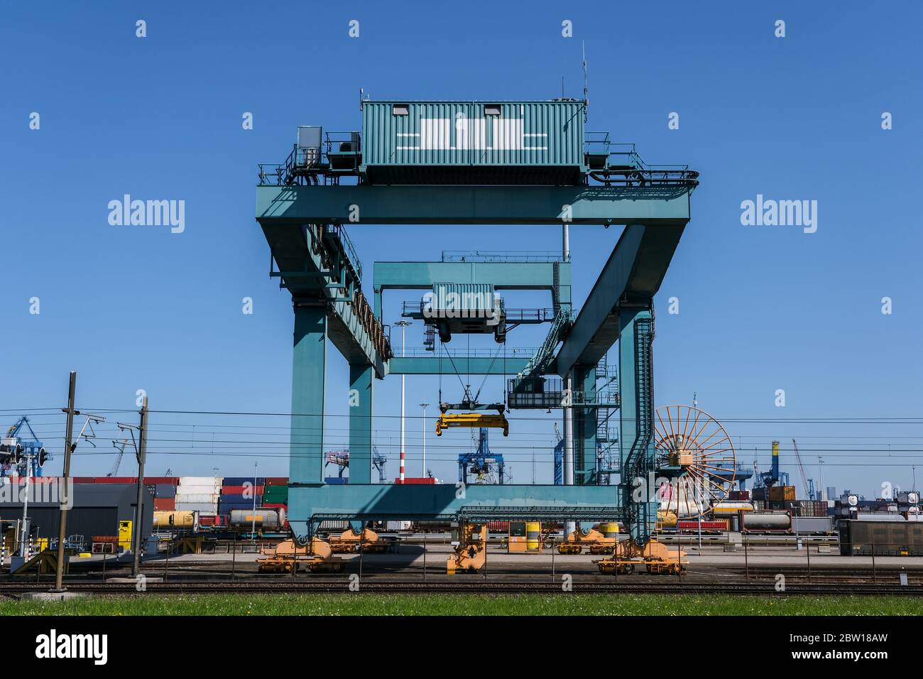 Cargo crane in the Port of Rotterdam. View of container terminal in the harbor Netherlands. Stock Photo