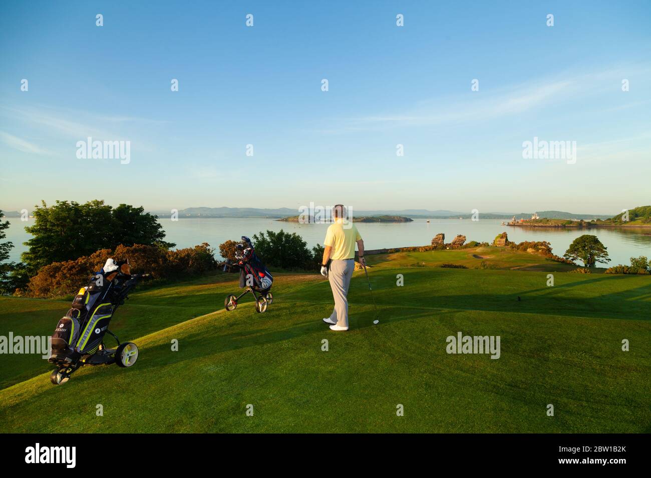 Aberdour, Fife, UK. 29th May, 2020. Andrew Hubble from Dalgety Bay teeing off at 5.30am on the first day of restrictions being lifted in Scotland Credit: Richard Newton/Alamy Live News Stock Photo