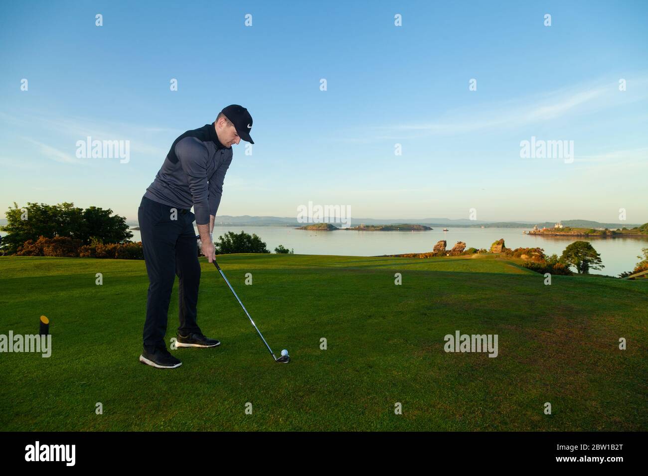 Aberdour, Fife, UK. 29th May, 2020. Marcus Kelman (30) from Dalgety Bay teeing off at 5.30am on the first day of restrictions being lifted in Scotland Credit: Richard Newton/Alamy Live News Stock Photo