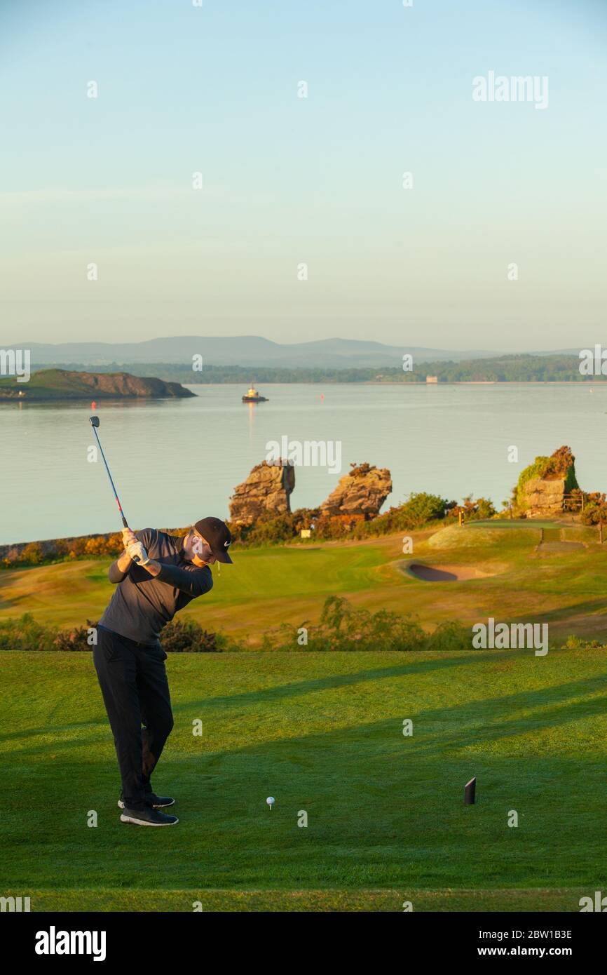 Aberdour, Fife, UK. 29th May, 2020. Marcus Kelman (30) from Dalgety Bay teeing off at 5.30am on the first day of restrictions being lifted in Scotland Credit: Richard Newton/Alamy Live News Stock Photo