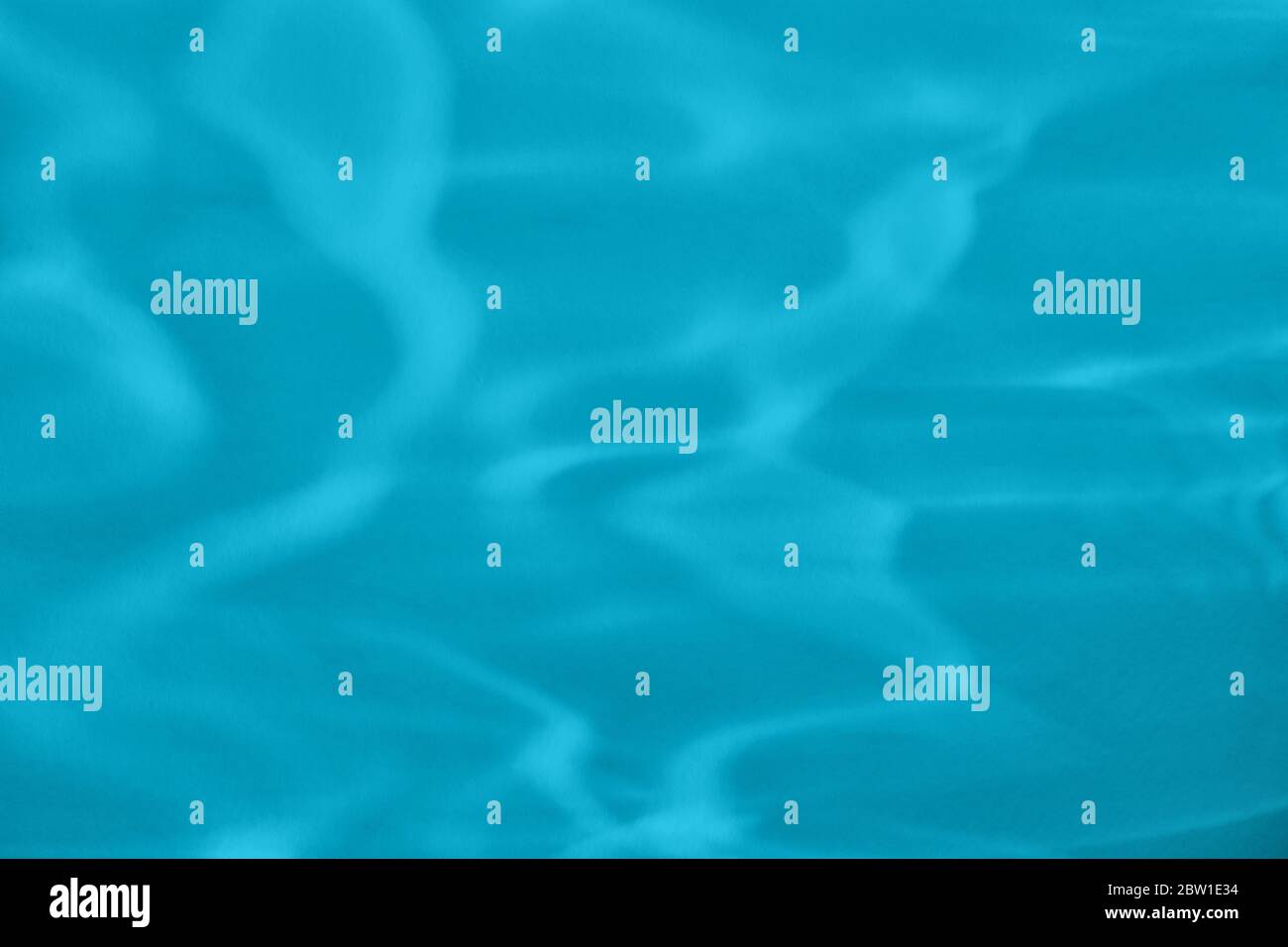 mint blue colored abstract background with light and shadows caustic