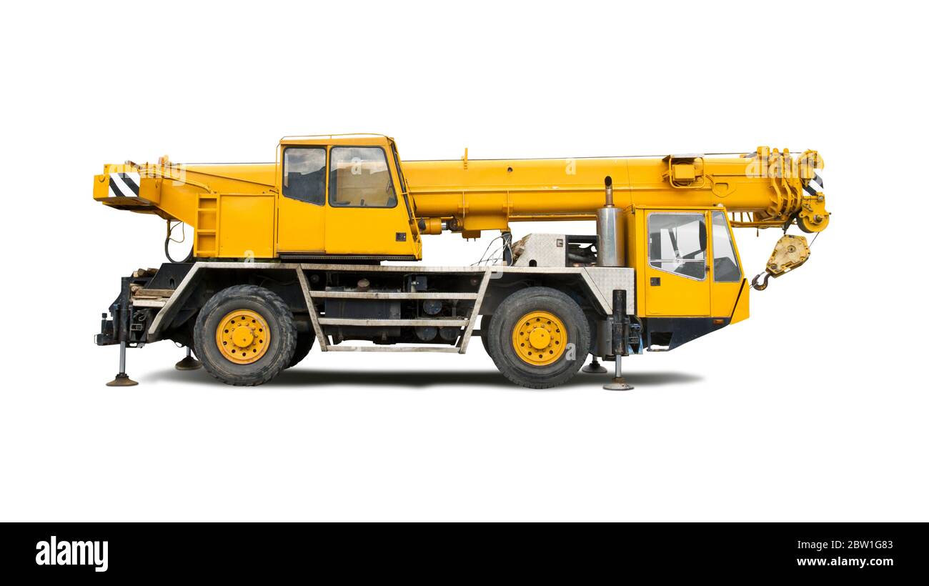 Yellow mobile crane truck isolated on white background Stock Photo