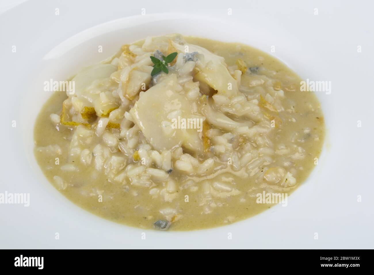 Risotto with pear and cheese Stock Photo Alamy