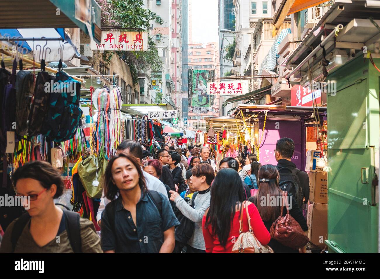 Hong Kong - November, 2019: Crowd of asian people on street market in Hong Kong, China Stock Photo