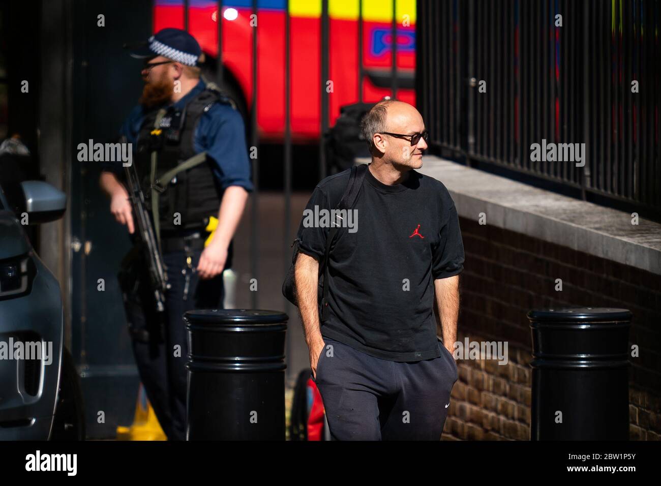 Dominic Cummings top aide to Prime Minister Boris Johnson arrives at the back of Downing Street after the introduction of measures to bring the country out of lockdown. Stock Photo