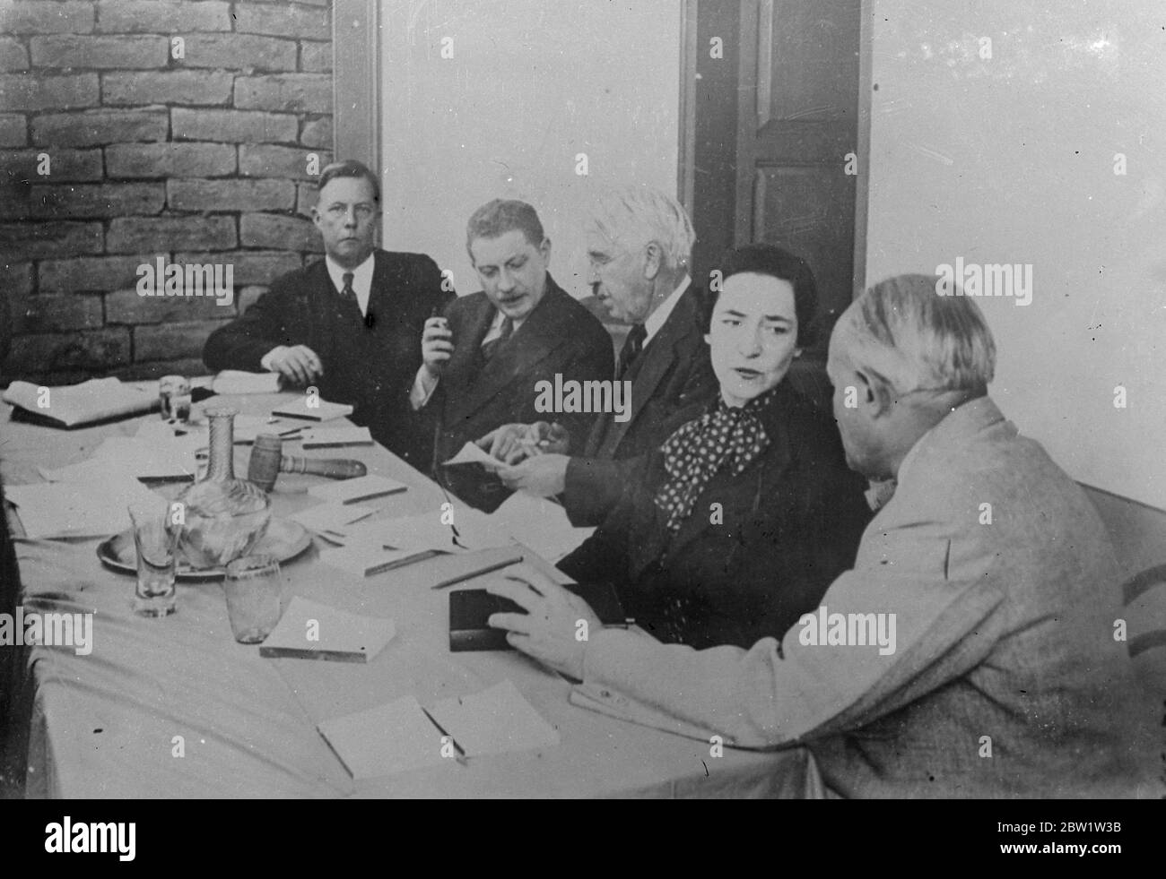 American commission examines Trotsky's treason. Police guard against Communists. At the request of Leon Trotsky, exiled Bolshevik leader, an American commission is sitting in Mexico City to examine changes of treason made against him by Moscow. The commission has been guarded by police against demonstrating Communists who declared that the hearing is farcical because the only evidence given will be that chosen by Trotsky himself. In a recent trial in Moscow, several prominent Soviet leaders were sentenced to death and others to terms of imprisonment for conspiring with Trotsky. Trotsky is now Stock Photo