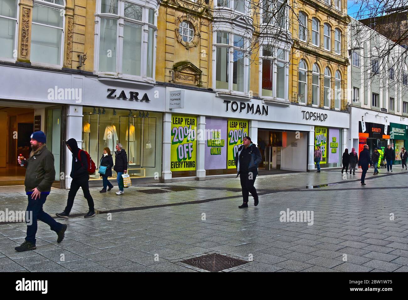 Stylish fashion shops including Zara, Topshop and Topman occupy this  prestigious old building in Queen Street in Cardiff City Centre Stock Photo  - Alamy
