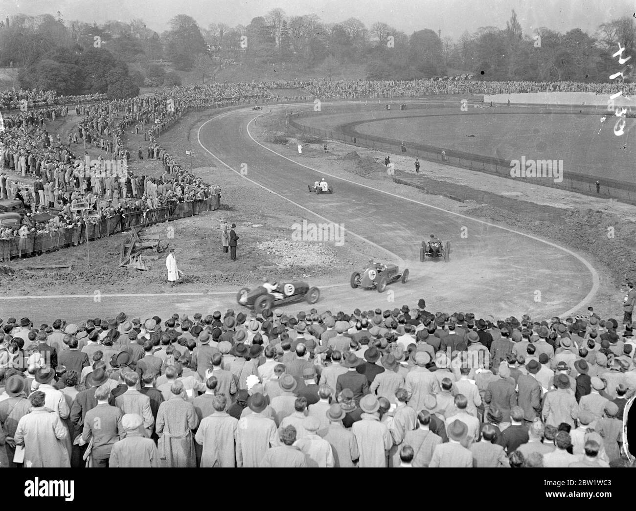 First race of a new Crystal Palace road racing circuit. The Coronation Trophy race was the inaugural event of the new Crystal Palace road racing circuit. Many famous drivers were entered hundred and 20 miles an hour were expected. Photo shows, a general view of the track during the race. 24 April 1937 Stock Photo