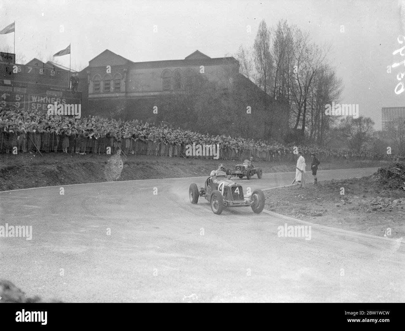 Coronation Trophy race on new Crystal Palace circuit. The Coronation Trophy race was the inaugural event the new Crystal Palace road racing circuit. Many famous drivers were entered and speed so husband 20 miles an hour were expected. Photo shows, E K Rayson ' s ,Maserati ( No 4) leading I F Connell's ERA around a bend 24 April 1937 Stock Photo
