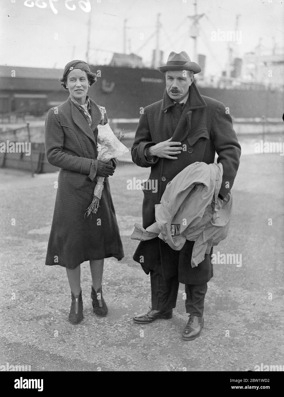 Lady Strathcona welcomed by her husband when she arrives home by flying boat. Lady Strathcona was met by her husband, Lord Strathcona, when she arrived at Southampton aboard the Imperial Airways Empire flying boat 'Cygnus'. Photo shows, lady Strathcona with Lord Strathcona at Southampton. 22 April 1937 Stock Photo