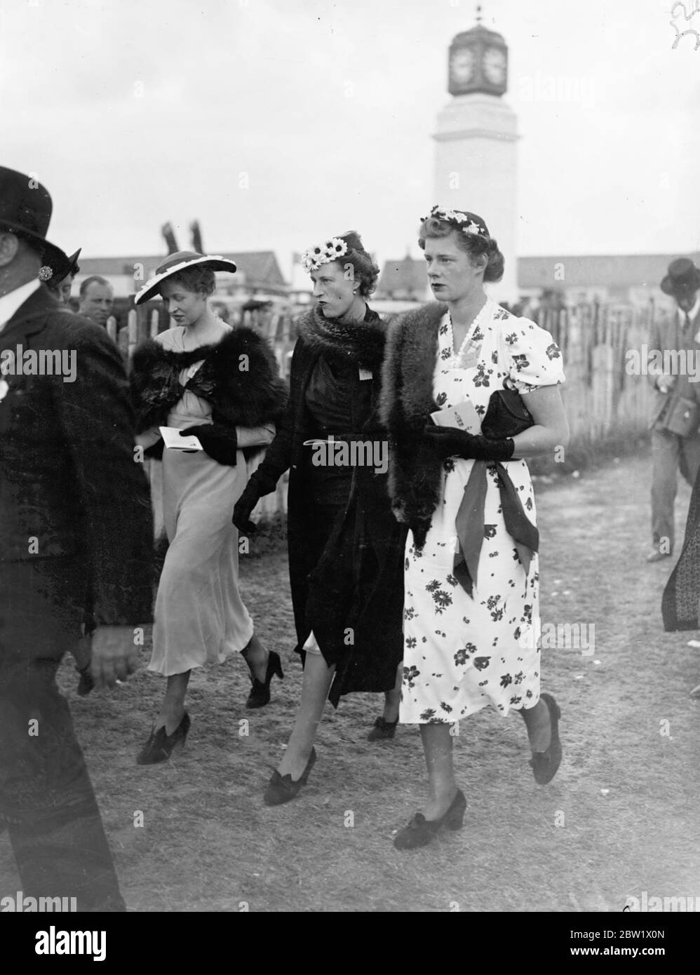 Small hats at Epsom on 'ladies Day'. Two small hats and one with a larger brim warm by smart women racegoers at Epsom on Oaks day. 4 June 1937 Stock Photo