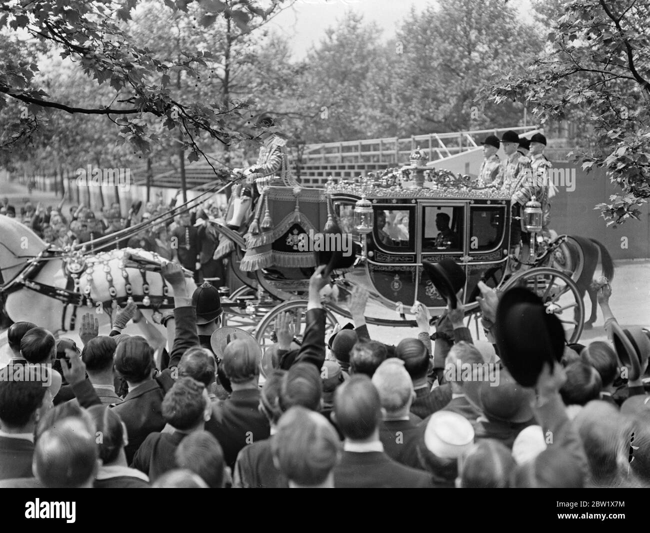 King drives in the State to St James's Palace for Levee. The King drove in State from Buckingham Palace to hold a levee. He was escorted by Household Cavalry and attended by his Gentleman in Waiting. Photo shows, the King in his coach as he drove to St James's Palace. 28 May 1937 Stock Photo