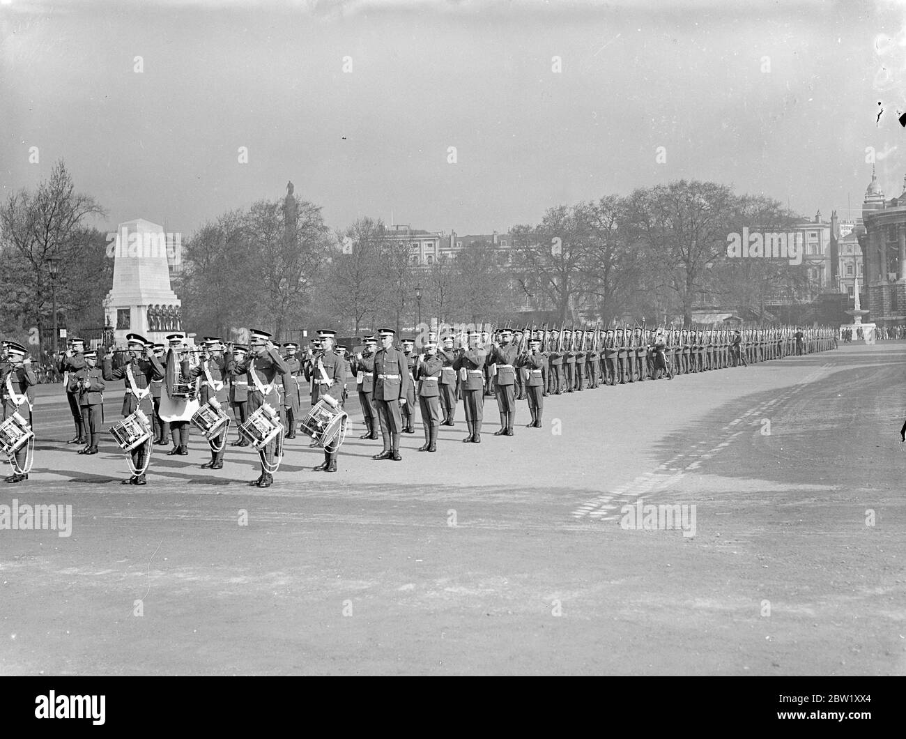 Coldstream Guards rehearse the trooping of the colour. Coldstream Guards rehearsed for the trooping the colour ceremony, to take place in June, on the Horse Guards Parade. Photo shows, Coldstream Guards parading at the rehearsal. 6 May 1937 Stock Photo