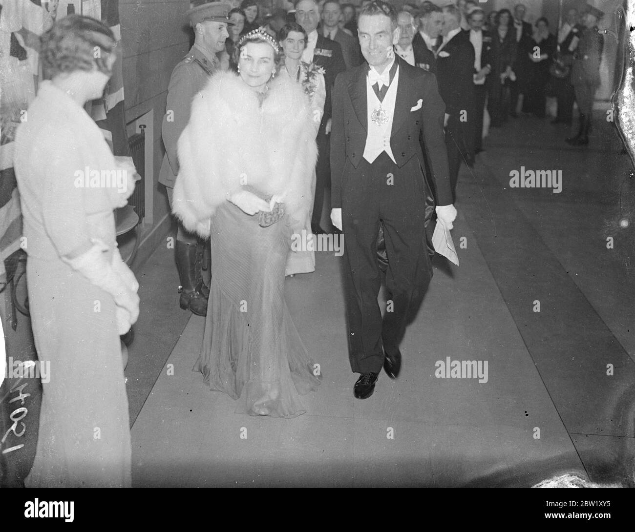 Duchess of Gloucester attends first world premiere in East End. The Duchess of Gloucester attended the first world premiere ever held in the East End, at the Granada, East Ham. The new British film 'London Melody 'was shown in aid of the Tower Hill improvement scheme. Photo shows, the Duchess of Gloucester arriving for the Premier. 30 April 1937 Stock Photo