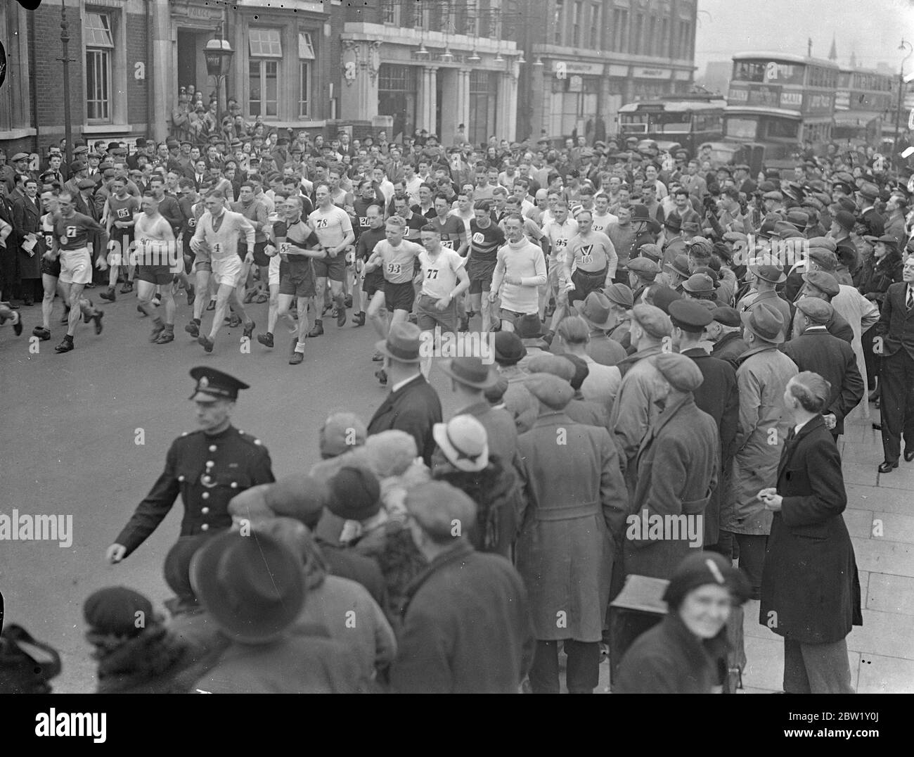 Police compete in Barking to Southend walk. Police athletes started from Barking police station on their annual Barking to Southend walk. Photo shows the start. 29 April 1937 Stock Photo