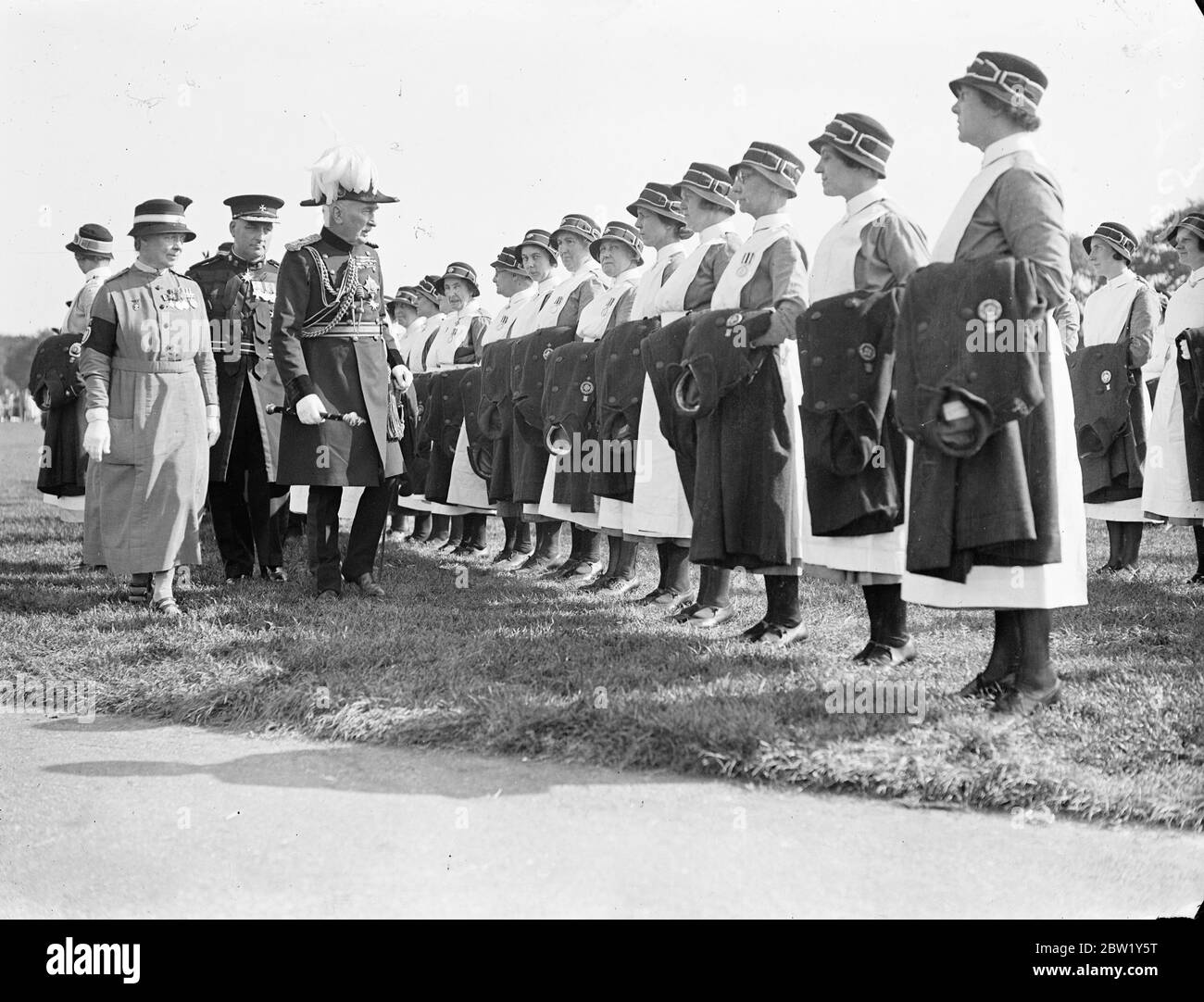 Sir Claude Jacob inspects London District of St John Ambulance Brigade. 5000 members of St John Ambulance Brigade were on parade in Hyde Park when Field Marshal Sir Claude W. Jacob inspected the London District section. This is the only occasion in the year on which the whole district is paraded. Photo shows: Sir Claude Jacob inspecting nurses at the parade. 5 June 1937 Stock Photo